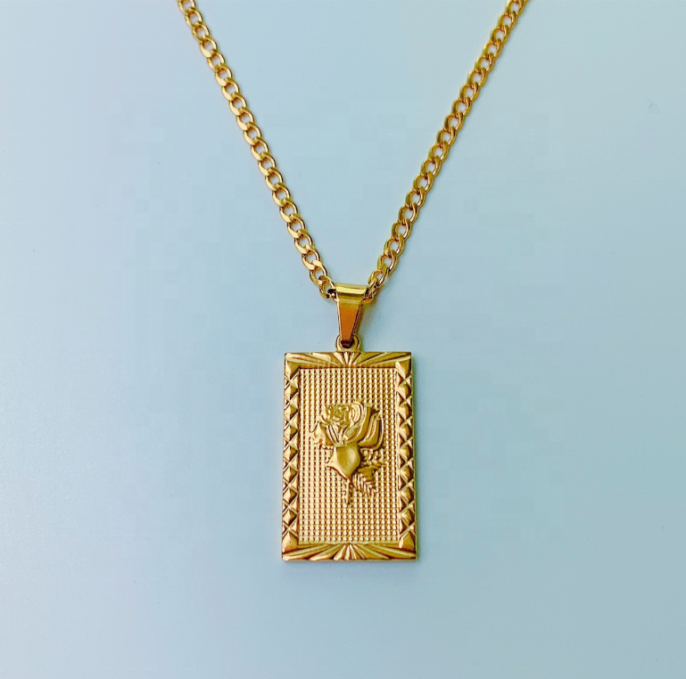gold rose rectangular pendant on gold curby chain